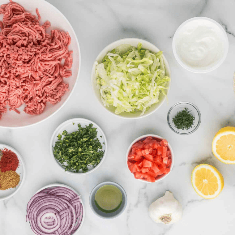 Ingredients needed for Air Fryer Turkish Lamb Wraps on kitchen table.