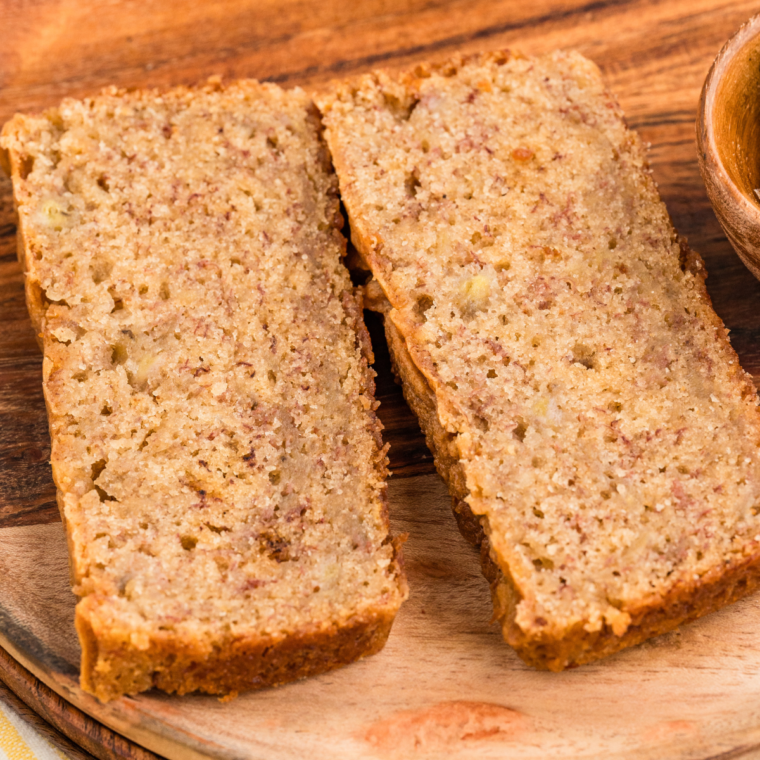 Sliced Weight Watchers banana bread on a plate, showing its moist and fluffy texture.