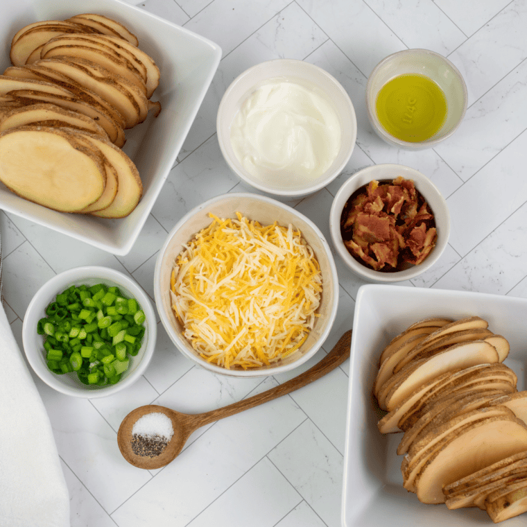 Ingredients for Blackstone potato chips: russet potatoes, oil, salt, pepper, cheese, and bacon