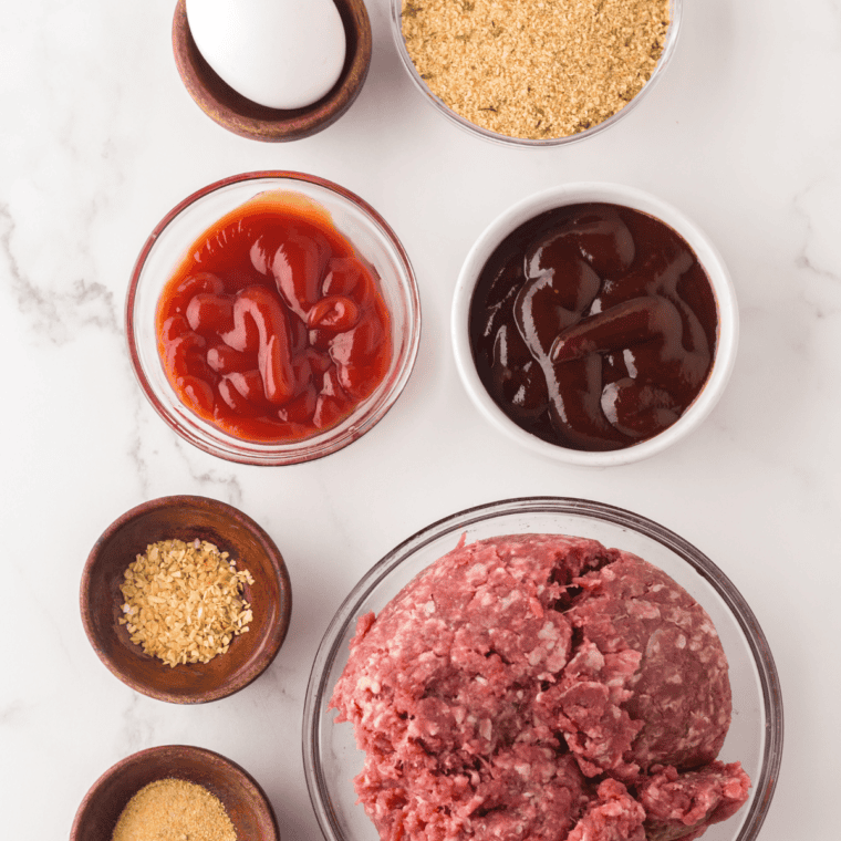 Ingredients needed for Copycat Cracker Barrel Meatloaf on kitchen table.