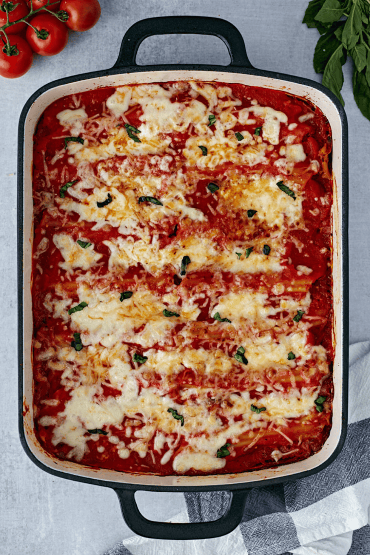 Stuffing manicotti shells with a creamy cheese mixture for a copycat Olive Garden dish.