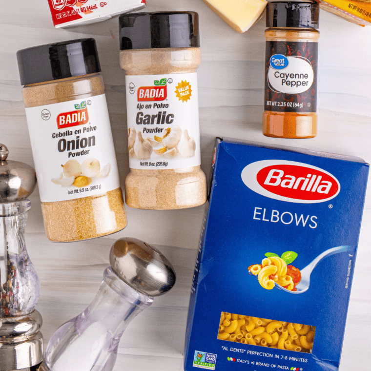 Ingredients needed for Creamy 3 Cheese Mac and Cheese on kitchen table.
