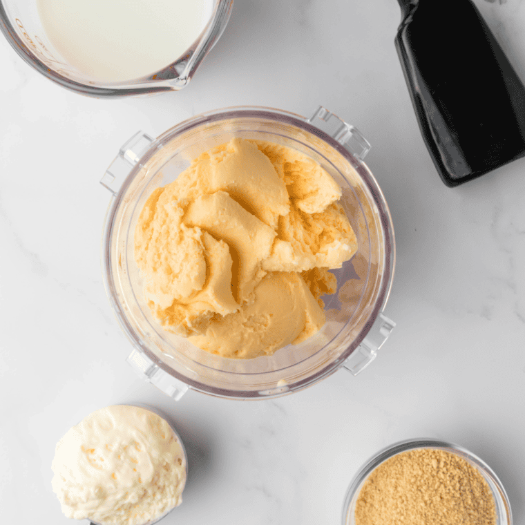 Ingredients needed for Ninja Creami Copycat Sonic Cheesecake Milkshake on kitchen table.