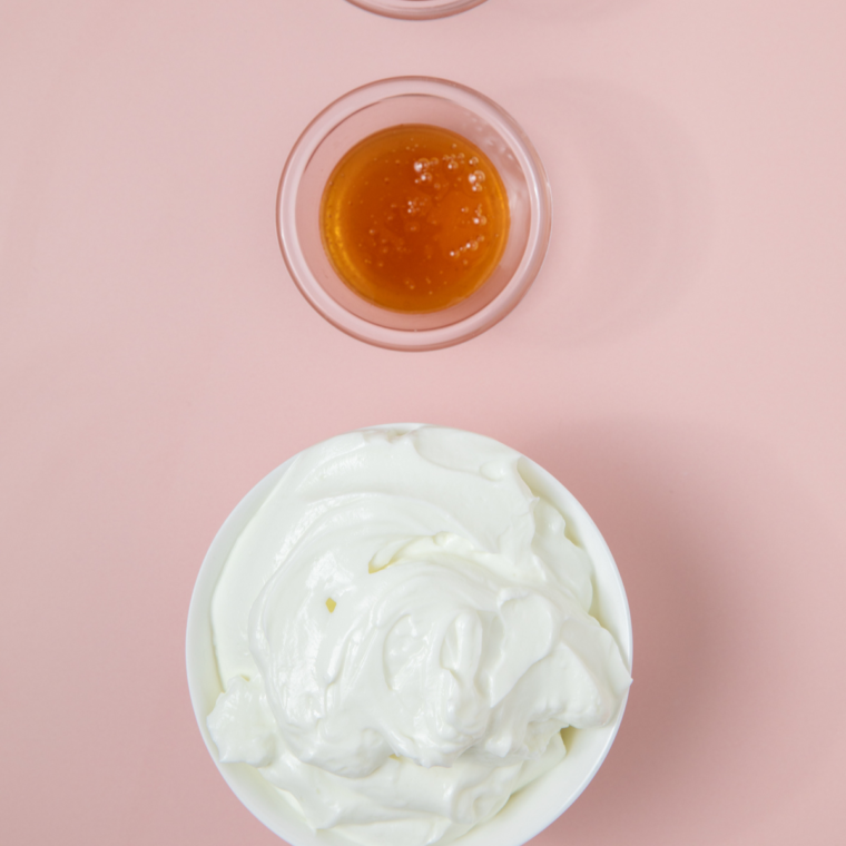 Ingredients needed for The Best Ninja Creami Frozen Yogurt Recipe on the kitchen table.