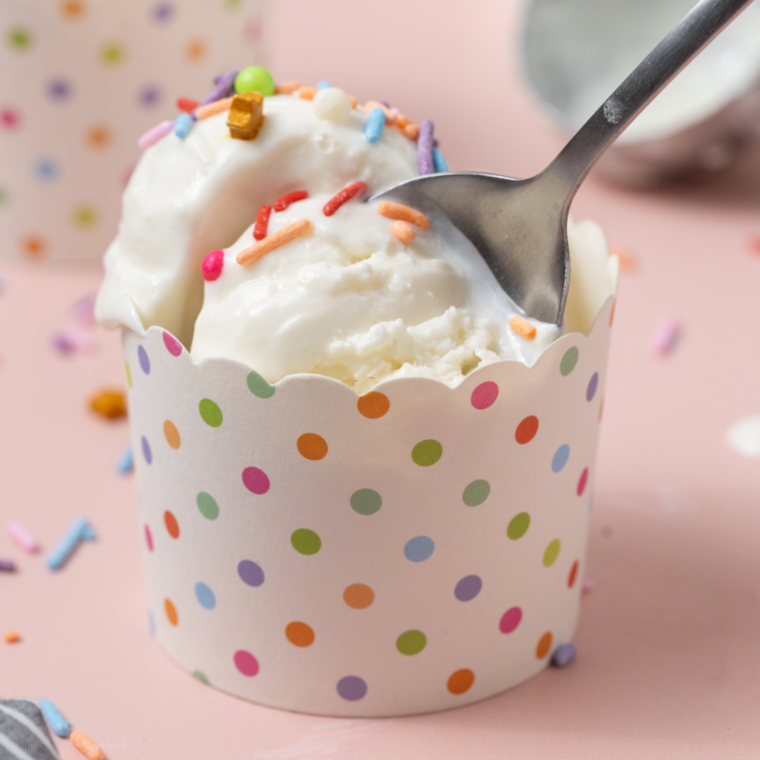 Creamy homemade frozen yogurt made in a Ninja Creami pint, ready to enjoy.