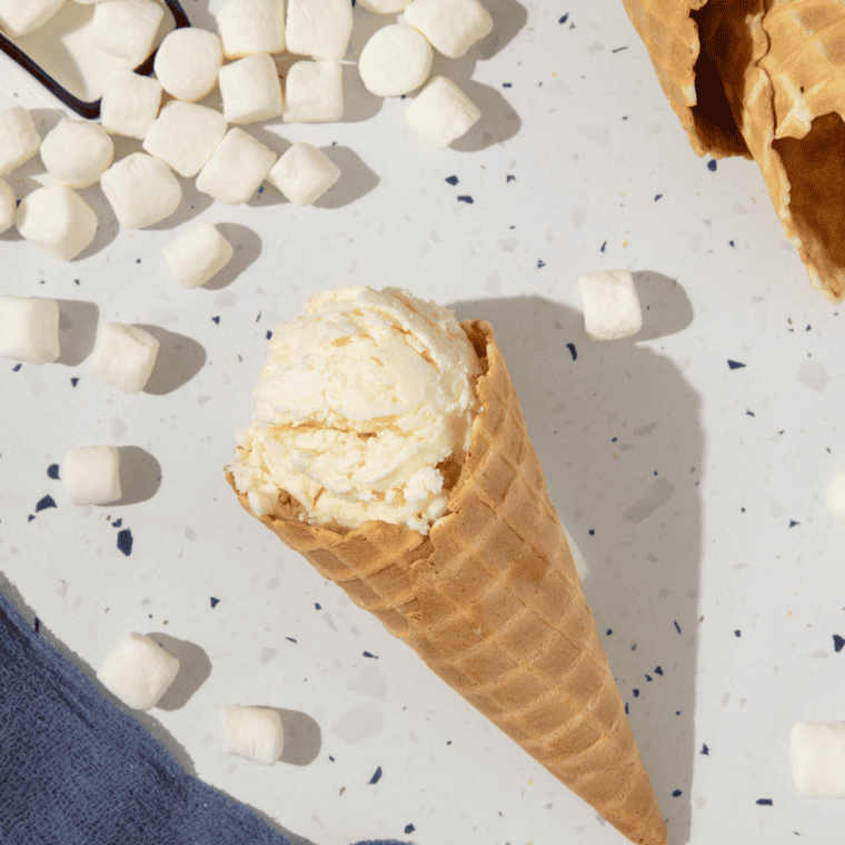 Ninja Creami Marshmallow Sky Ice Cream topped with marshmallow swirls, a homemade version of Ben & Jerry's dessert.