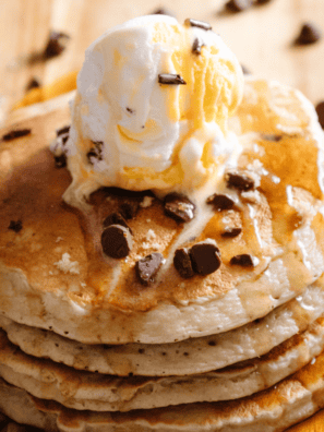 "Fluffy golden pancakes cooked on a Ninja Woodfire grill with a smoky outdoor flavor"