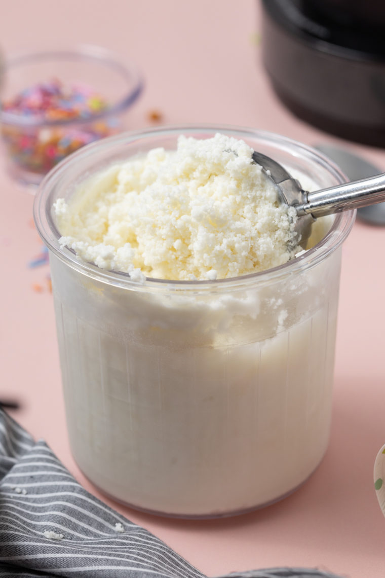 Scooped homemade frozen yogurt served in bowls with optional toppings.