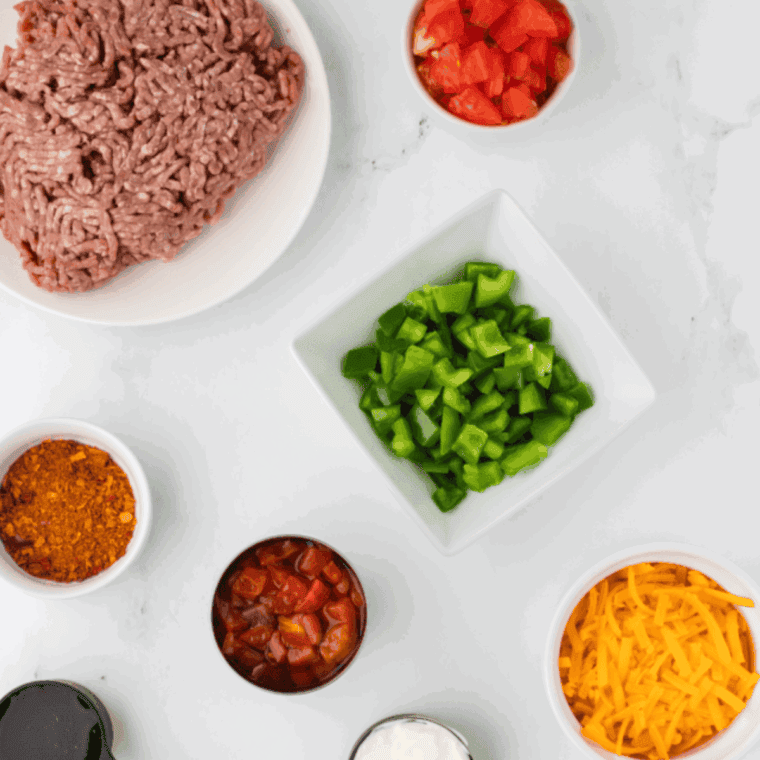 Ingredients for air fryer ground beef casserole laid out on a kitchen counter