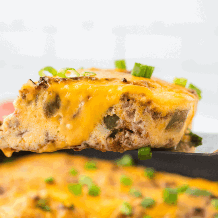 Baked air fryer ground beef casserole with golden melted cheddar on top