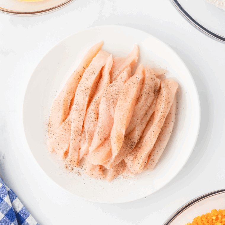 Crushed Cheetos in a food processor ground to a coarse crumb for coating