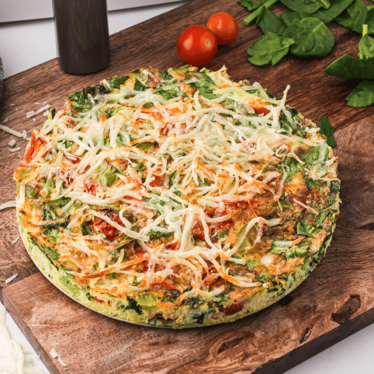 Air Fryer Italian Frittata with eggs, vegetables, Parmesan, and mozzarella cheese, cooked to perfection for a fluffy, savory meal.