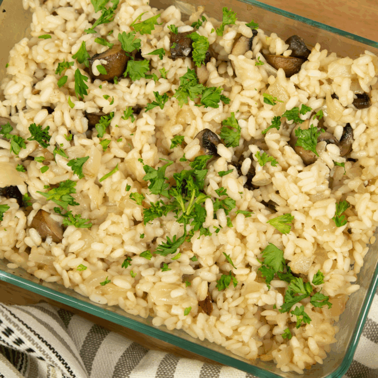 Close-up of risotto showing tender arborio rice and fresh herbs