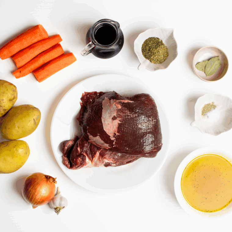 Ingredients needed for Air Fryer Yankee Pot Roast on kitchen table.