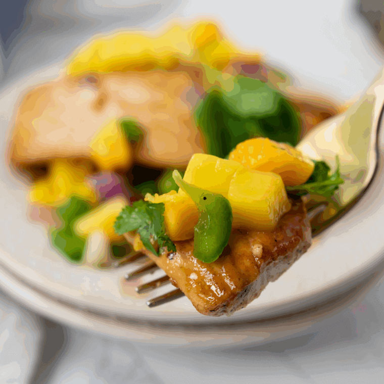 Flaky griddled mahi mahi with a golden crust, fresh off the Blackstone