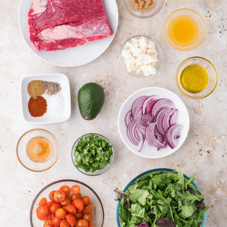 Ingredients needed for Easy Trader Joe’s Carne Asada Salad on kitchen table.