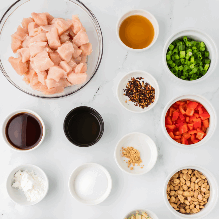 Ingredients needed for Kung Pao Chicken Spaghetti (Copycat) on kitchen table.
