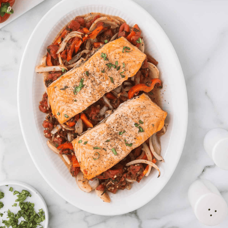 Air-fried salmon fillets topped with fresh tomato, basil, garlic, and balsamic glaze, inspired by Olive Garden's Salmon Bruschetta.