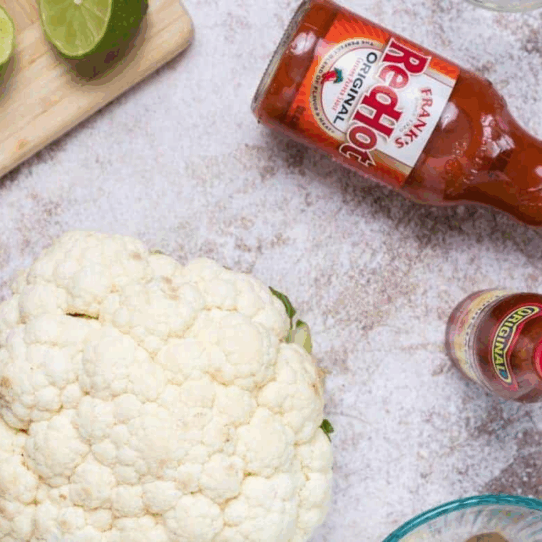 Ingredients needed for Air Fryer Buffalo Cauliflower Dip on kitchen table.