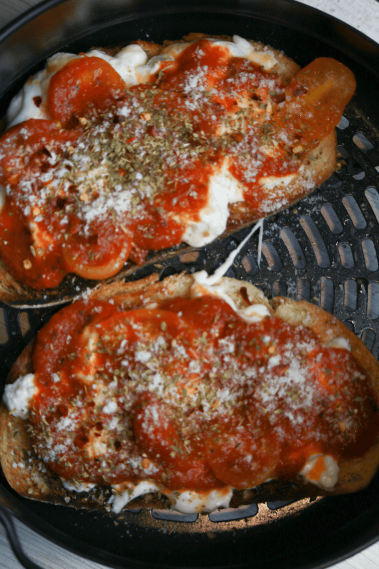 Air fryer pizza with melted burrata cheese, fresh toppings, and crispy golden crust
