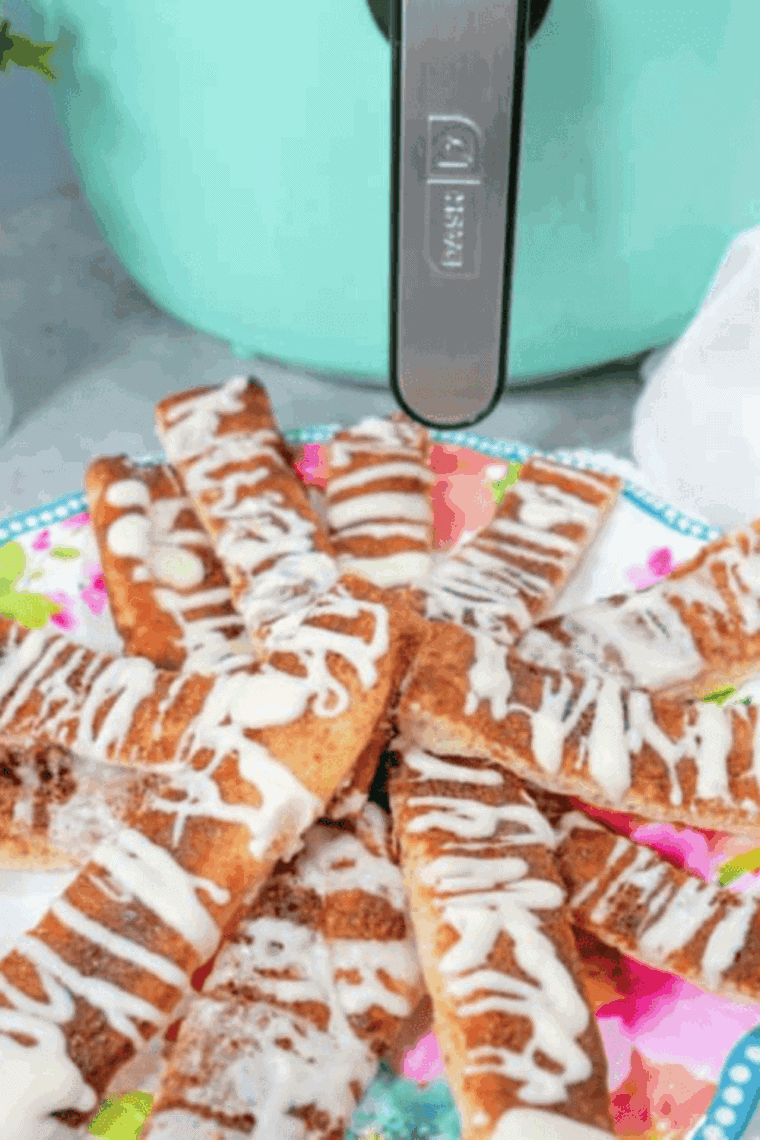 A close-up showing the crispy, sugary crust of a homemade air fryer cinnamon stick.
