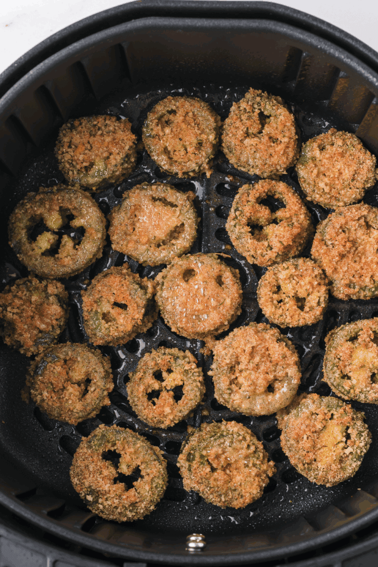 Air Fry: Preheat the air fryer to 375°F (190°C) and arrange the coated jalapenos in a single layer, lightly spraying with cooking spray.