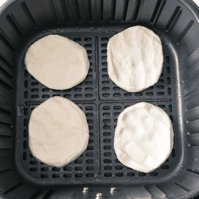 Grand's biscuits pressed into rectangles to form maple bar shapes on a cutting board