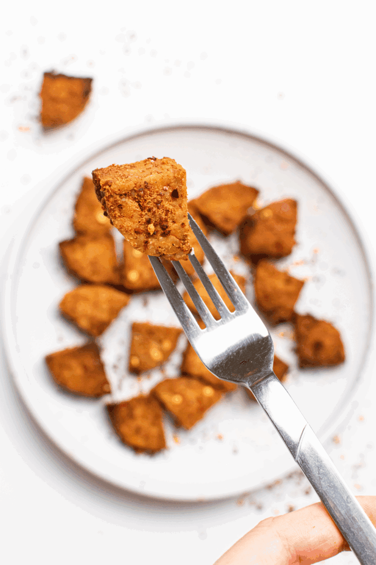 Golden and crispy Air Fryer Tempeh, perfect for adding protein to your meals, served with your favorite dipping sauce or toppings.