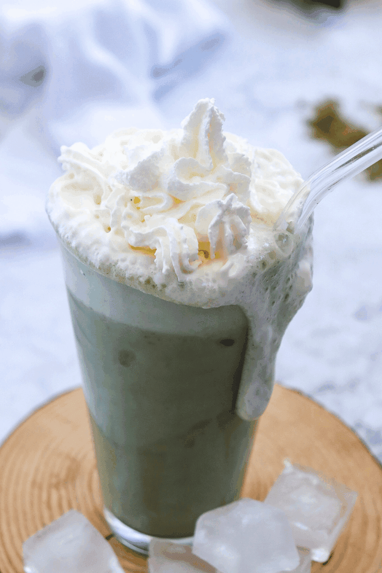 Ninja Creami Starbucks Matcha Green Tea Frappuccino with a creamy texture and vibrant green matcha flavor, topped with whipped cream.