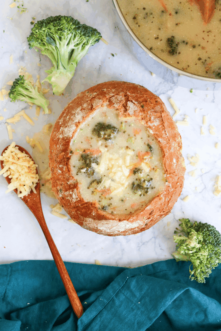 Homemade Applebee’s broccoli cheese soup in a bowl with melted cheddar on top