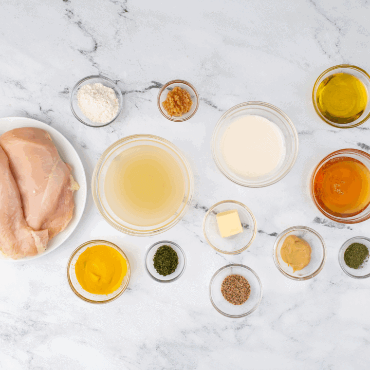 Ingredients needed for Applebee's Honey Mustard Sauce on kitchen table.