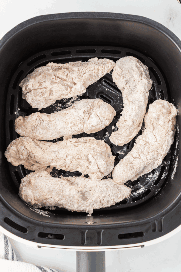 Place Applebee’s Chicken Tenders in the air fryer basket.