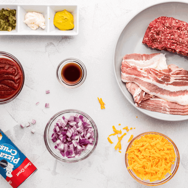 Ingredients needed for Copycat Domino's Cheeseburger Pizza Recipe on kitchen table.