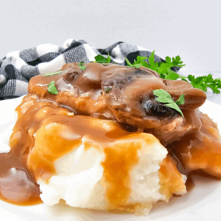 Tender pork chops smothered in brown gravy cooked in the crockpot.