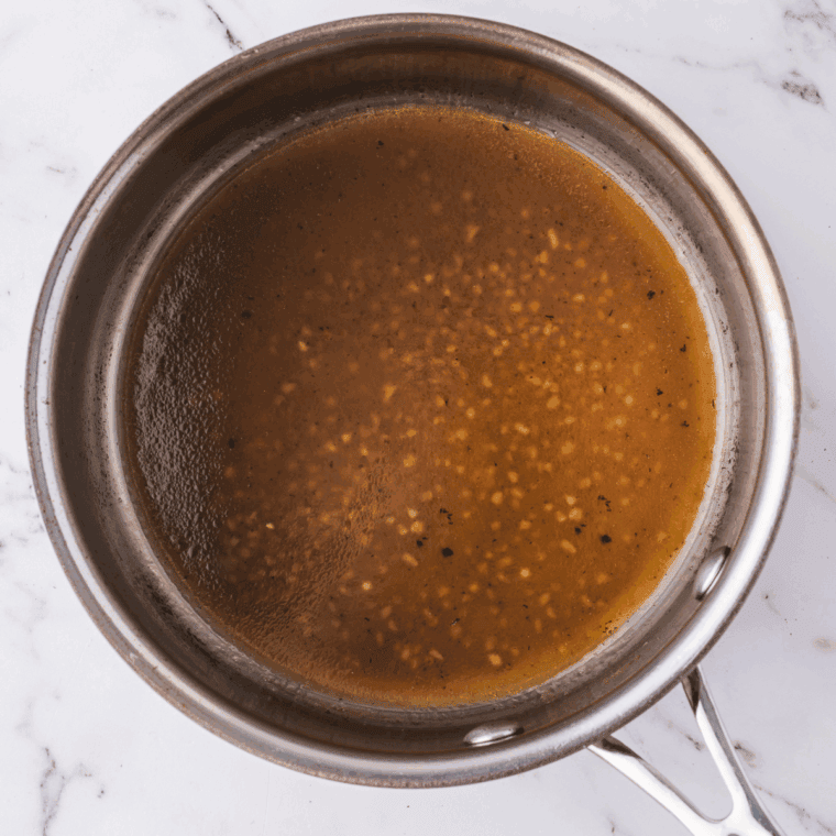 Cooking the KFC Gravy in the saucepan.
