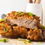 A homemade sauce full of traditional ingredients such as mirin, gochujang sauce, and minced ginger among others, is poured over pork ribs to create these bright, bold Korean BBQ ribs.