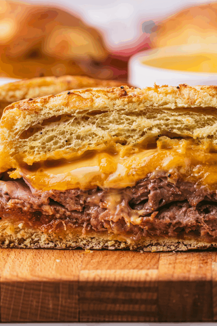 Smooth and creamy Arby’s cheddar cheese sauce in a bowl, ready for dipping fries or pouring over sandwiches.
