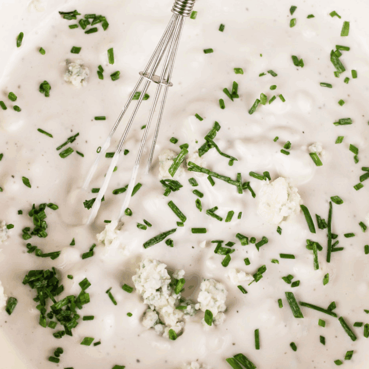 Whisk all of the ingredients in a mixing bowl.