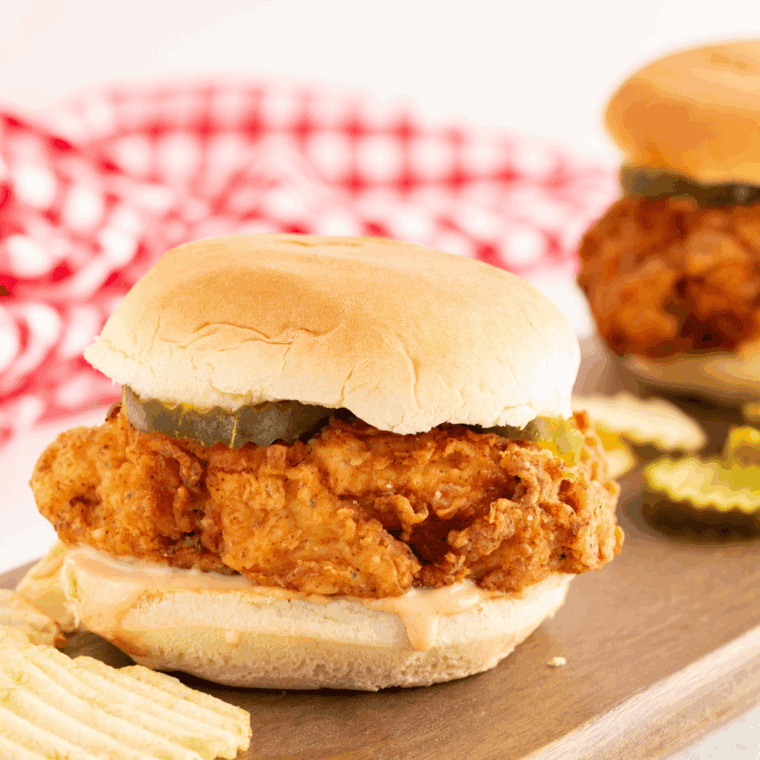 Homemade Arthur Treacher’s Chicken Sandwich with crispy fried fillet, lettuce, and tartar sauce on a toasted bun.