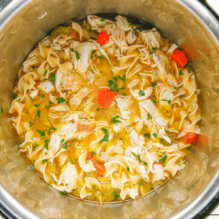 Shred the chicken after it's cooked and add it to the soup.