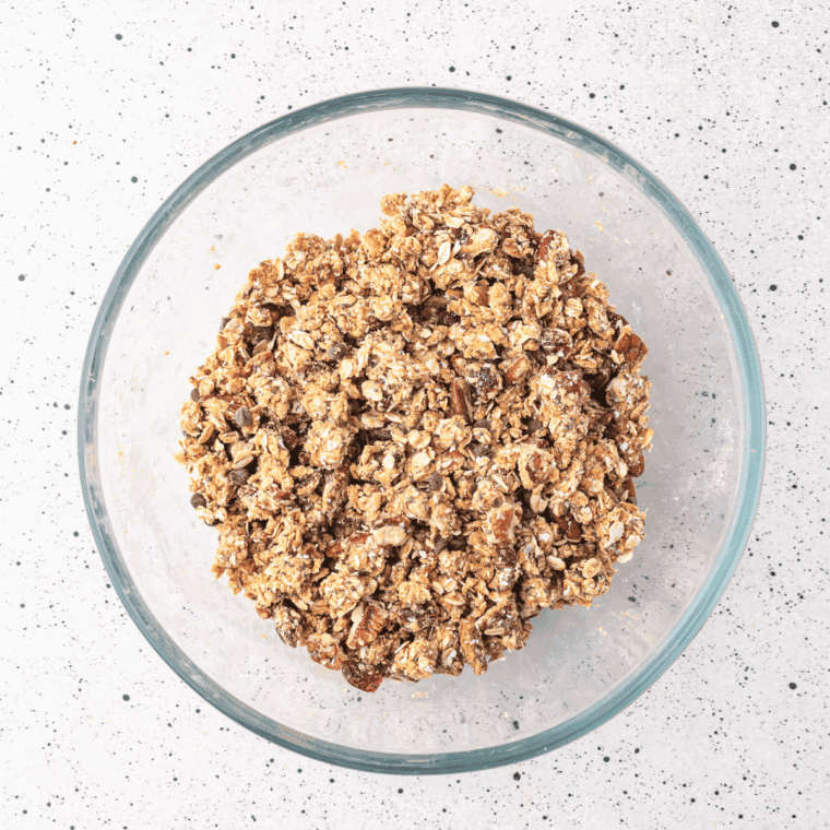 Add the wet ingredients into the dry ingredients to form the base of the bars.