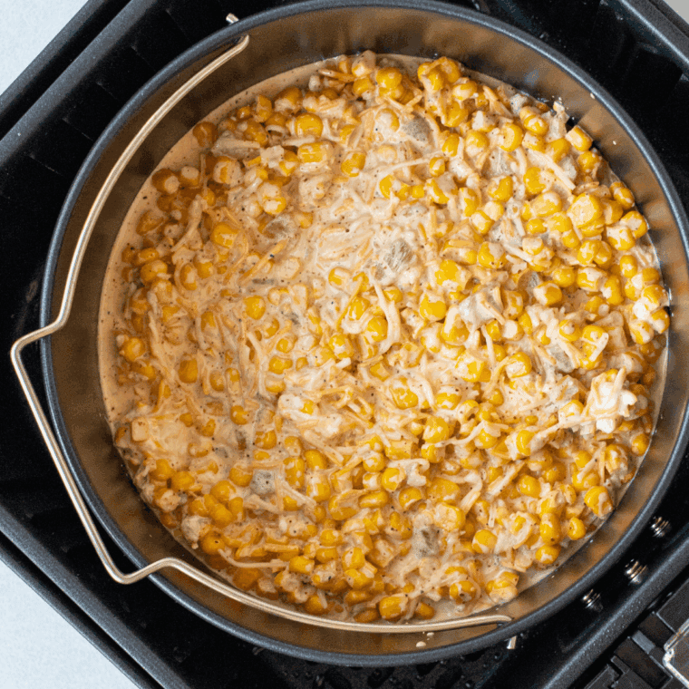 Crumbled cotija cheese folded into the creamy corn mixture before baking