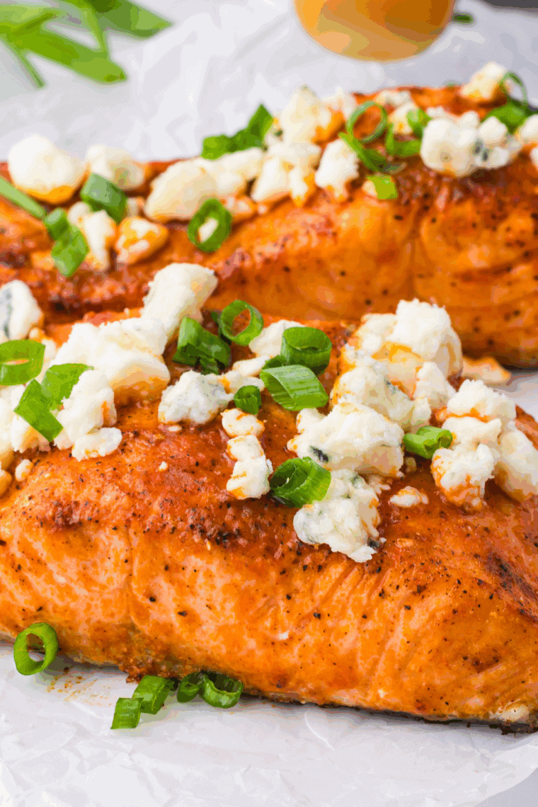 Homemade LongHorn Steakhouse-style blue cheese dressing served in a bowl with crumbled blue cheese