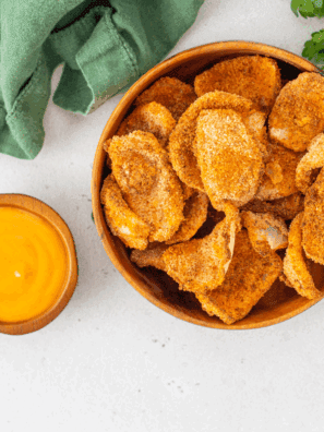 "LongHorn Steakhouse style Texas Tonion dipping sauce served in a small bowl with crispy onion petals for dipping"