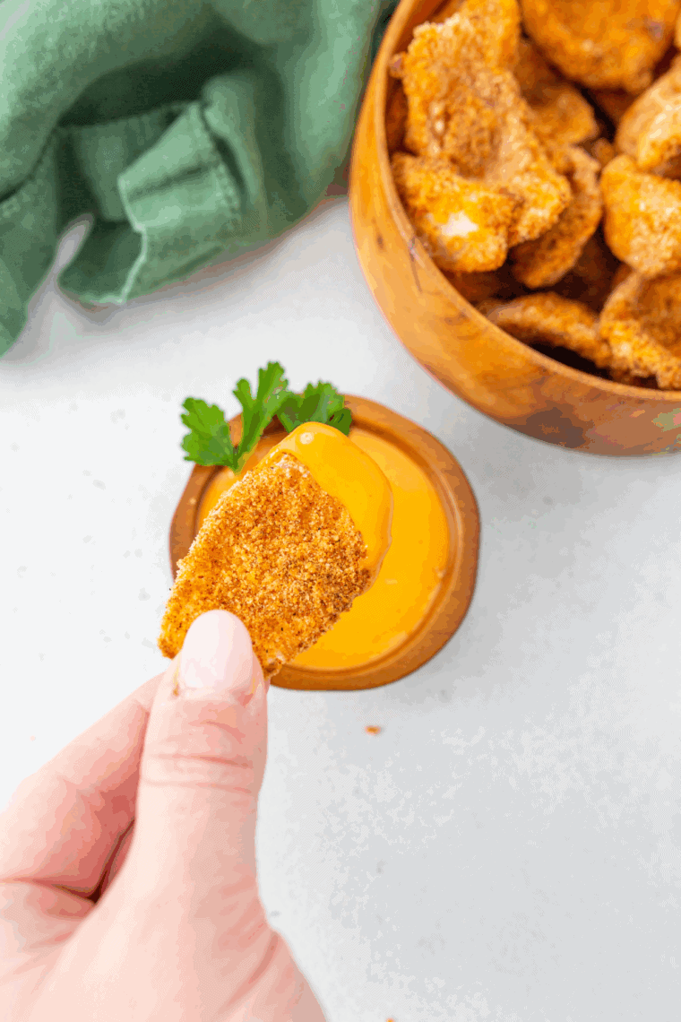 LongHorn Steakhouse style Texas Tonion dipping sauce in a small bowl, served with crispy onion petals for dipping.