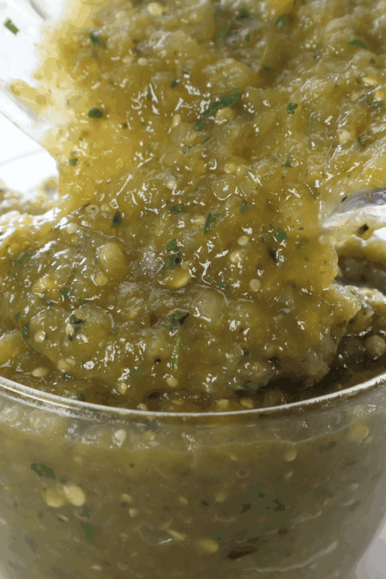 Homemade Abuelo’s Copycat Fresh Tomatillo Salsa served in a bowl with tortilla chips.