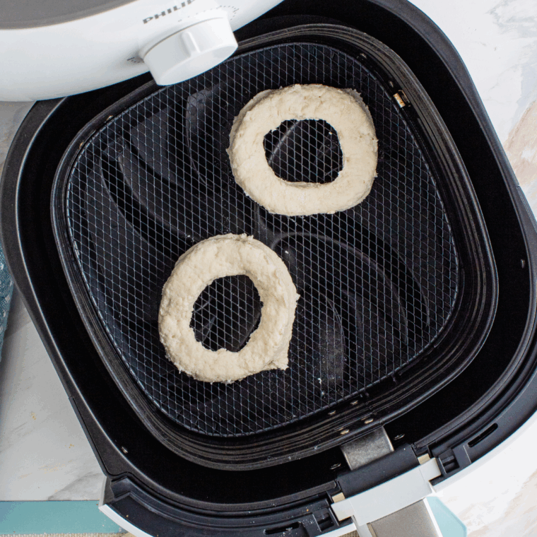 Place the shaped donut into the air fryer basket.