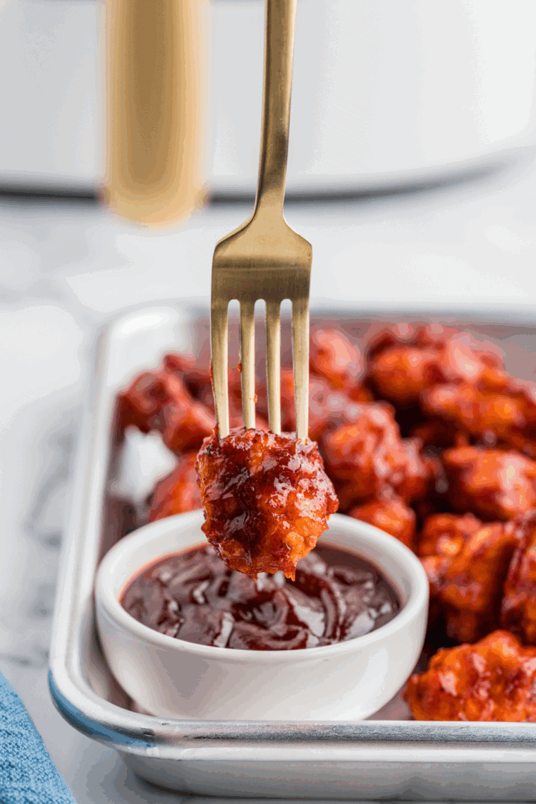 Homemade Dairy Queen-style BBQ sauce in a small bowl with a spoon