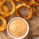 "Homemade Dairy Queen Brazier Burger Sauce copycat served in a small bowl with a spoon, ready for spreading on burgers."