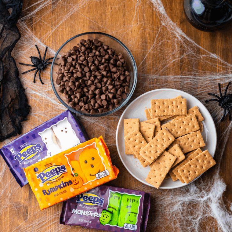 Ingredients needed for Easy Air Fryer Halloween S’mores Dip on kitchen table.